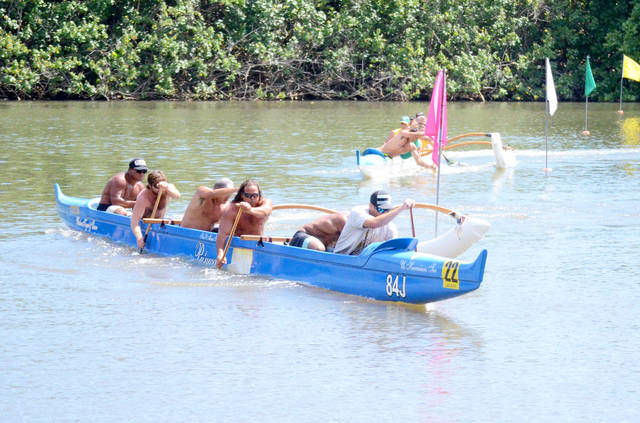 Racing on the river - The Garden Island