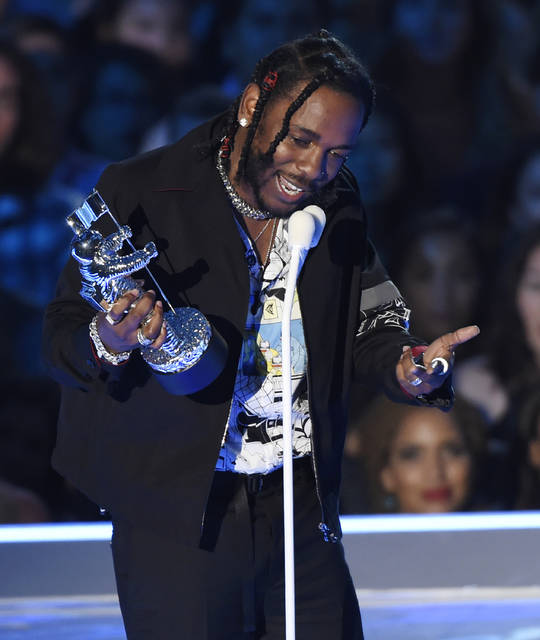 Kendrick Lamar kicks off Grammys with powerful performance The Garden